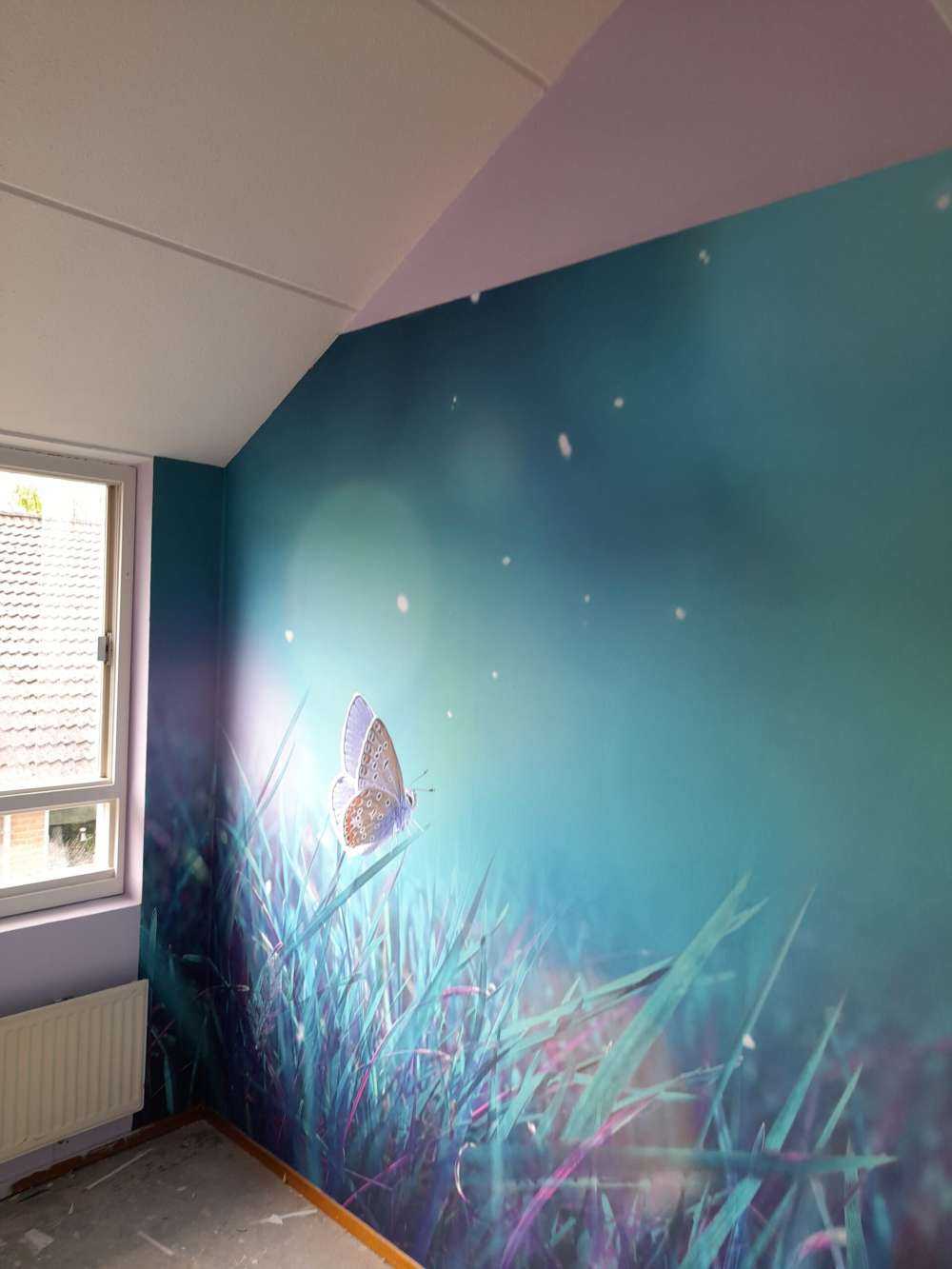 Motyl w porannej rosie