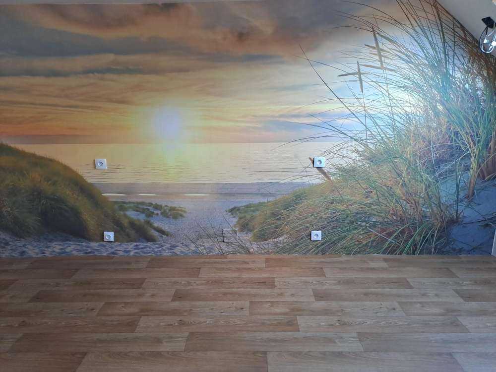 Zachód słońca na plaży wydmowej