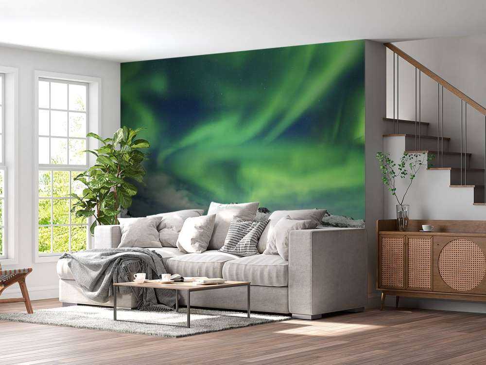 Światła północy nad zimowym krajobrazem