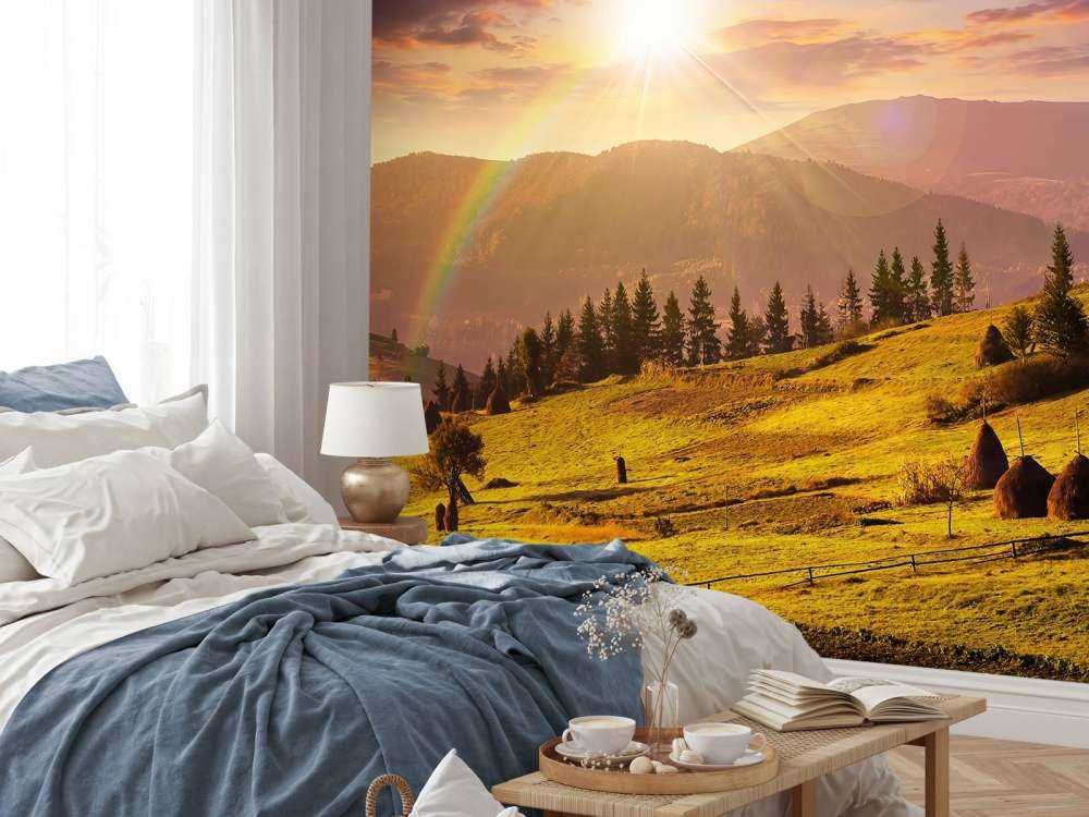 Stogi siana w górskim krajobrazie