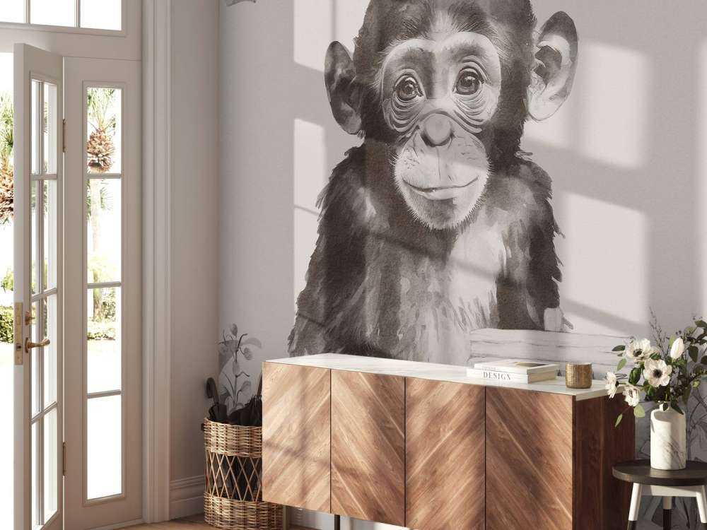 Mały szympans w beżowej dżungli