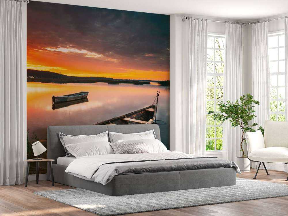 Łodzie o zachodzie słońca