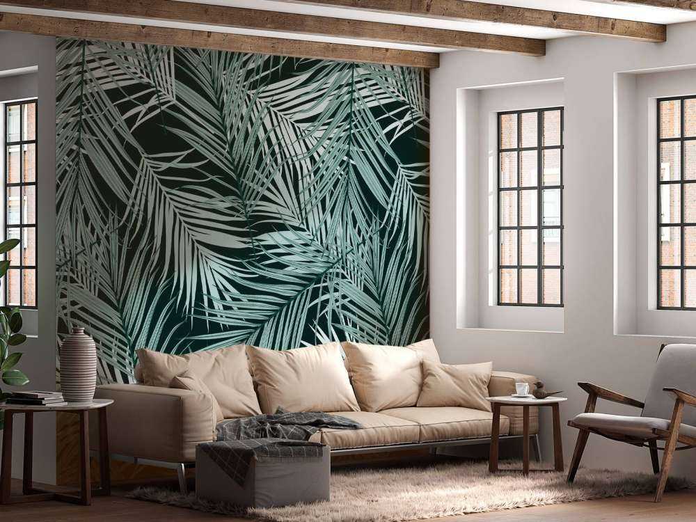 Tropikalne liście na czarnym tle