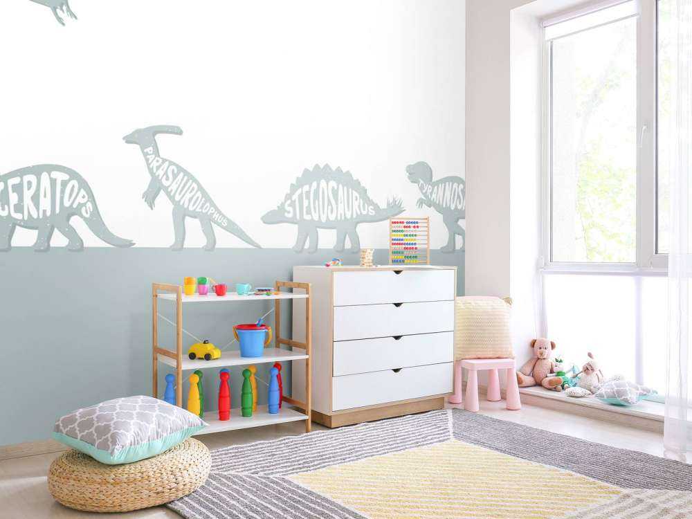 Dinozaury z tekstem w kolorze niebieskim