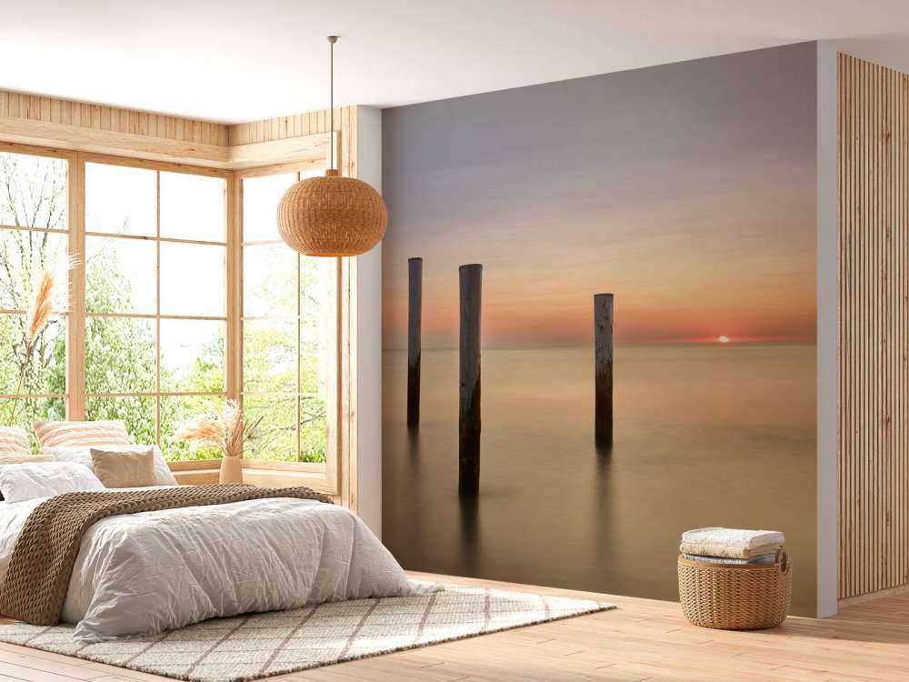 Trzy drewniane słupki