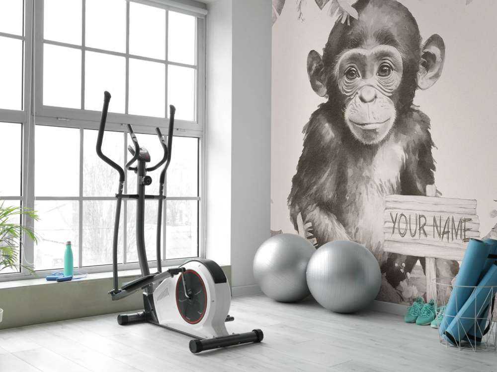 Mały szympans w beżowej dżungli