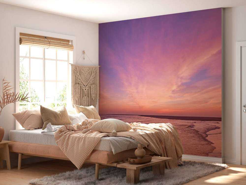 Plaża z różowym zachodem słońca