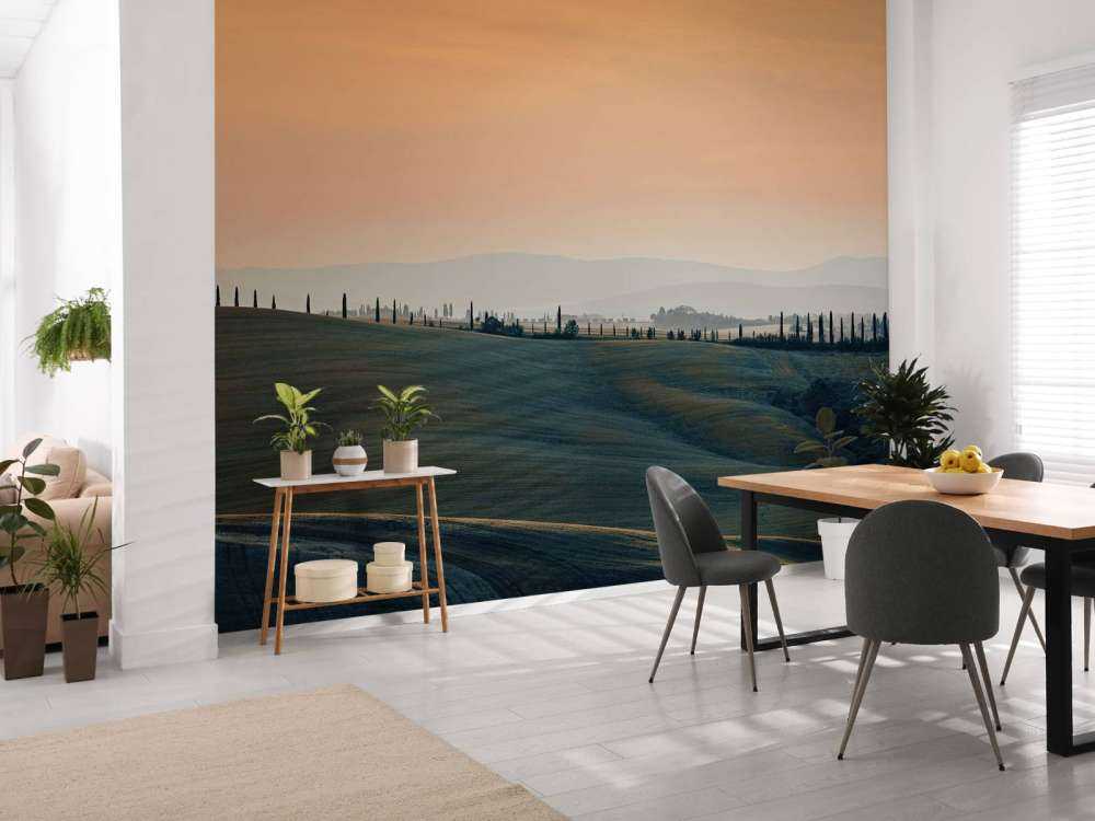 Pomarańczowa poświata nad włoskim krajobrazem