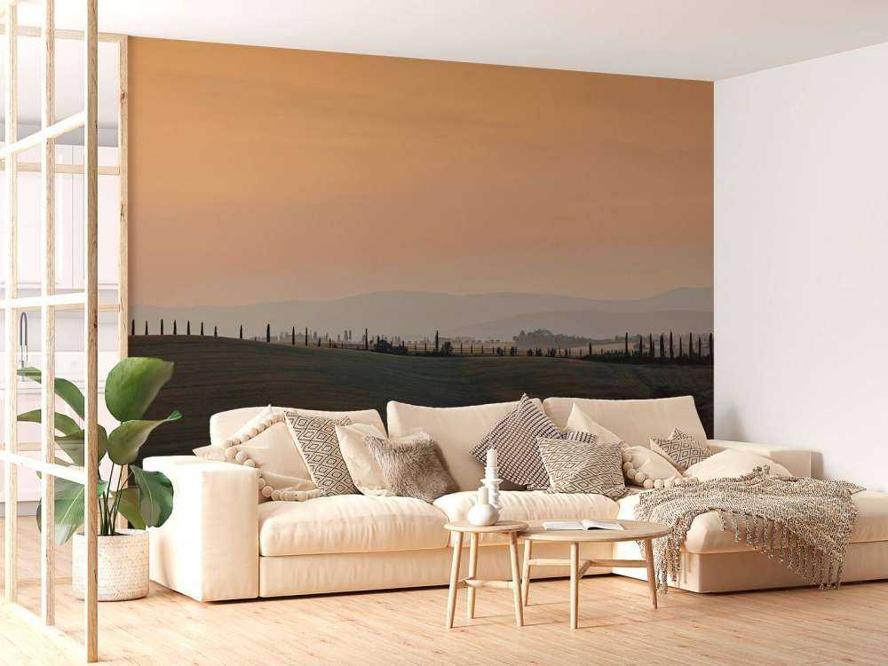 Pomarańczowa poświata nad włoskim krajobrazem