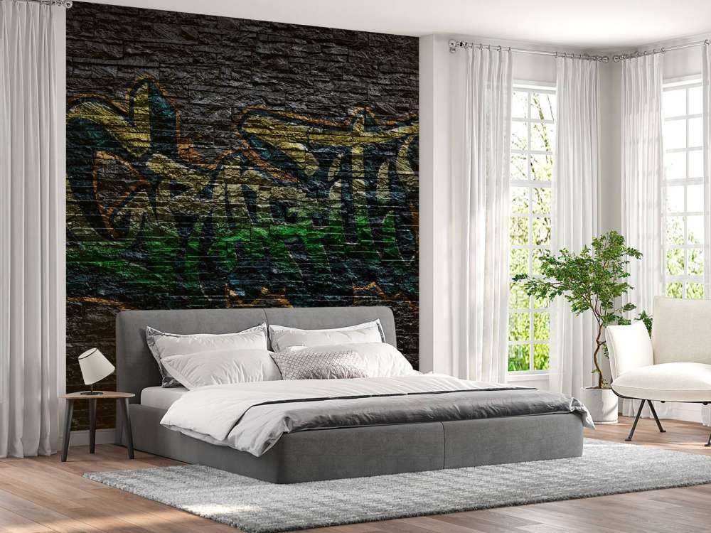 Graffiti na czarnych cegłach