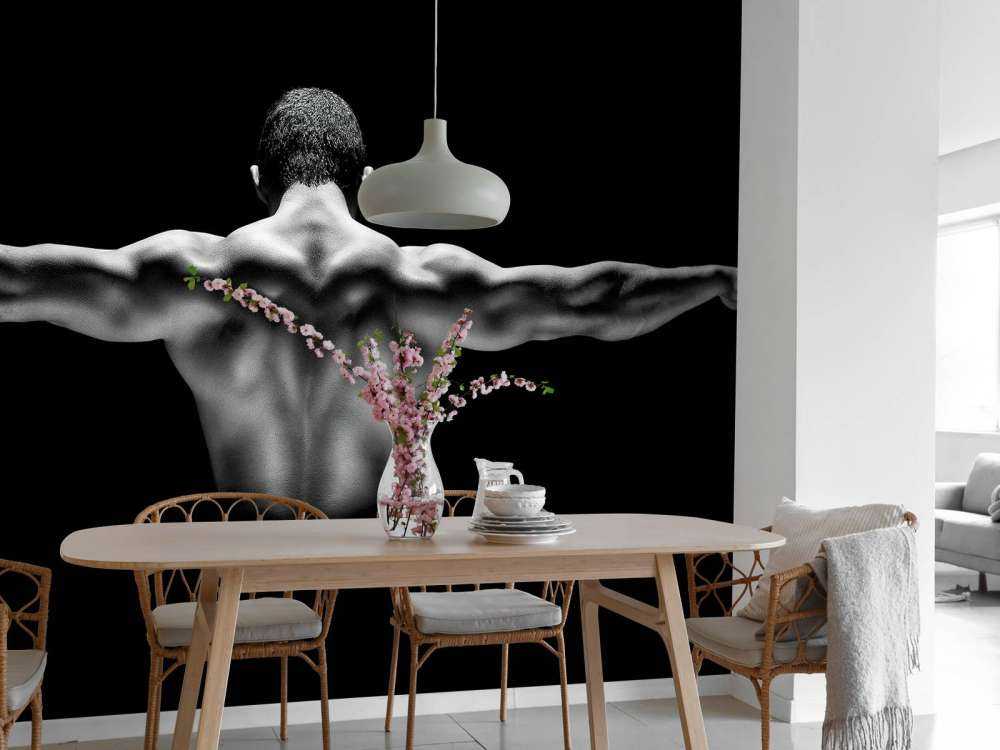 Człowiek z wyciągniętymi ramionami