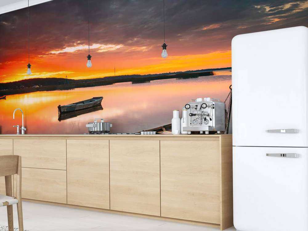 Łodzie o zachodzie słońca