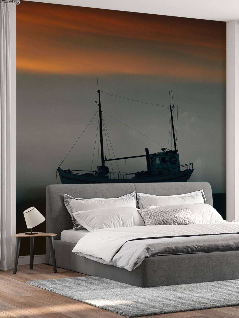 Łódź o zachodzie słońca