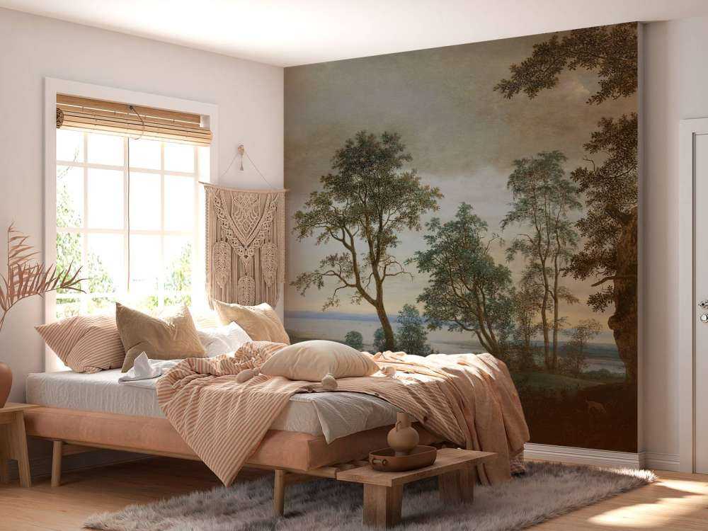 Krajobraz rzeczny widziany przez drzewa