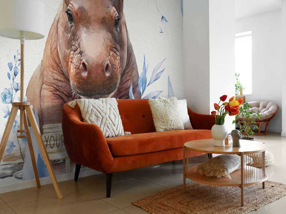 Mały hipopotam w liściach w kolorze niebieskim