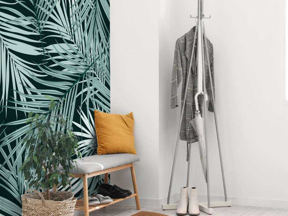 Tropikalne liście na czarnym tle