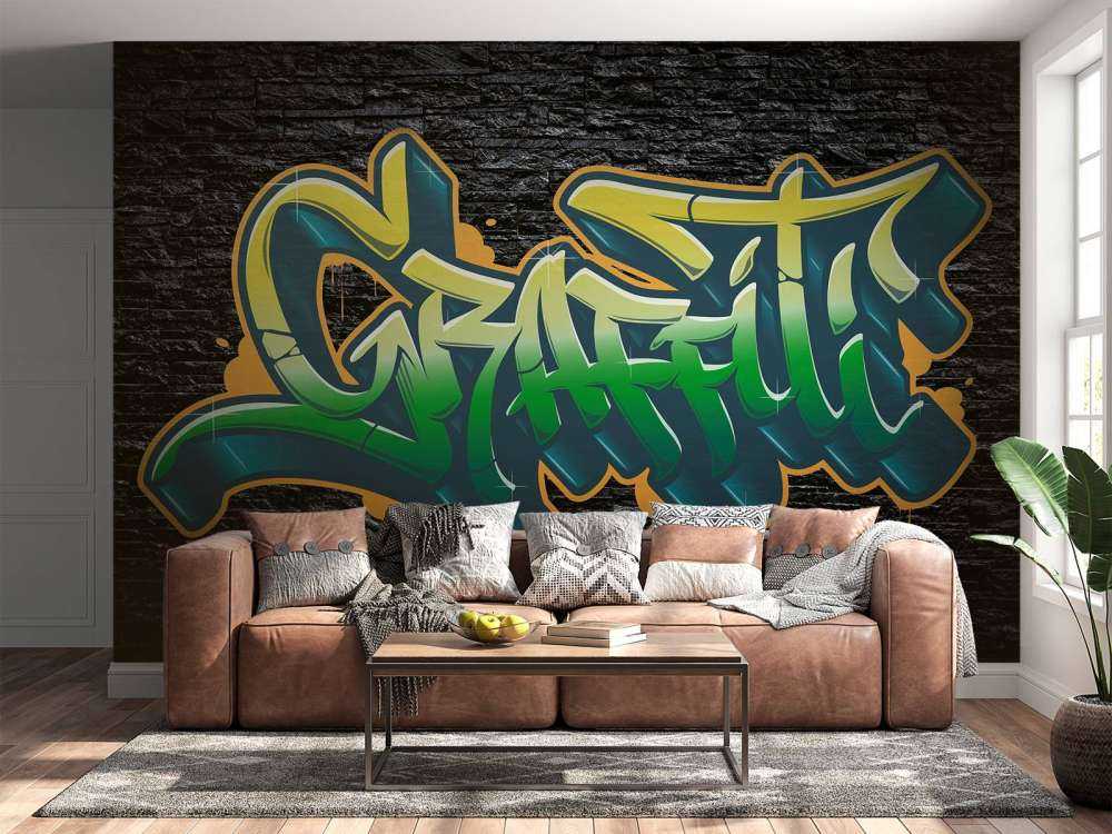 Graffiti na ścianie z czarnej cegły