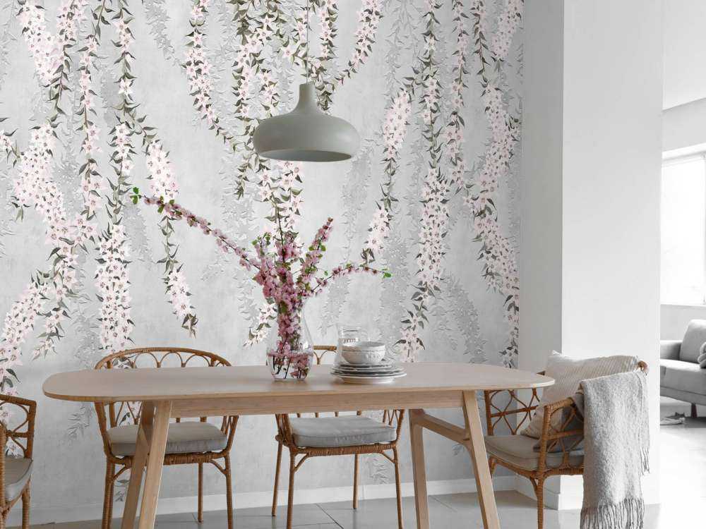 Gałęzie kwiatów na jasnoniebieskim betonie