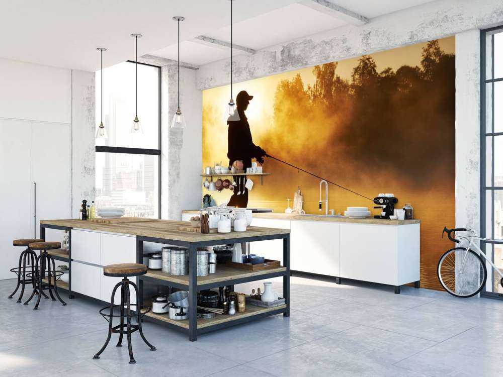 Rybak o wschodzie słońca