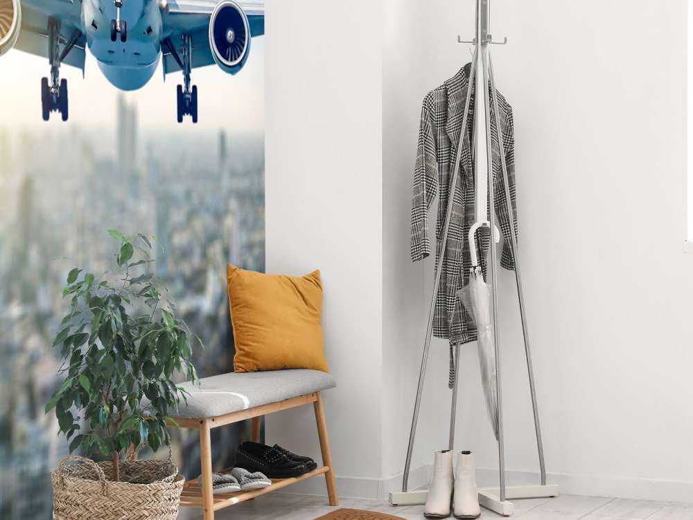 Zlatujący się samolot nad miastem