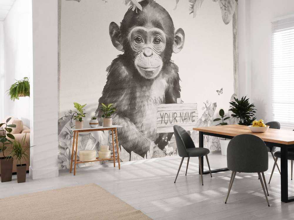 Mały szympans w beżowej dżungli