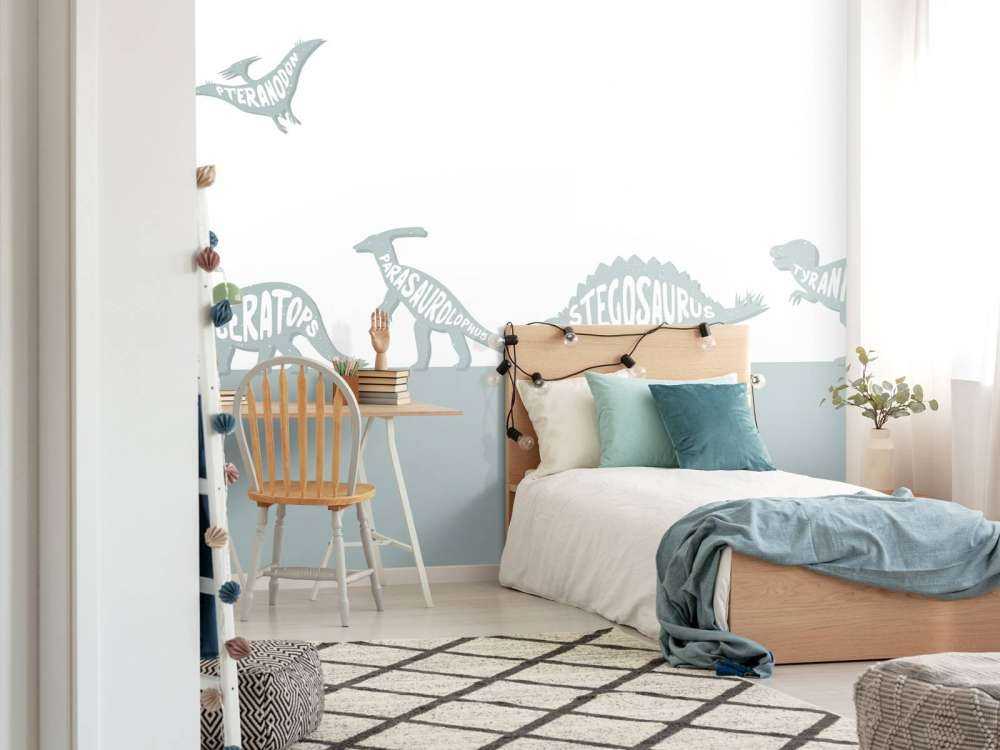 Dinozaury z tekstem w kolorze niebieskim