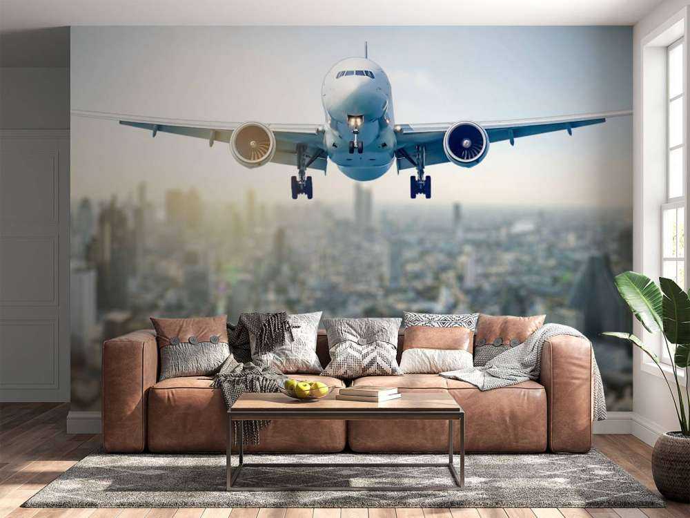 Zlatujący się samolot nad miastem