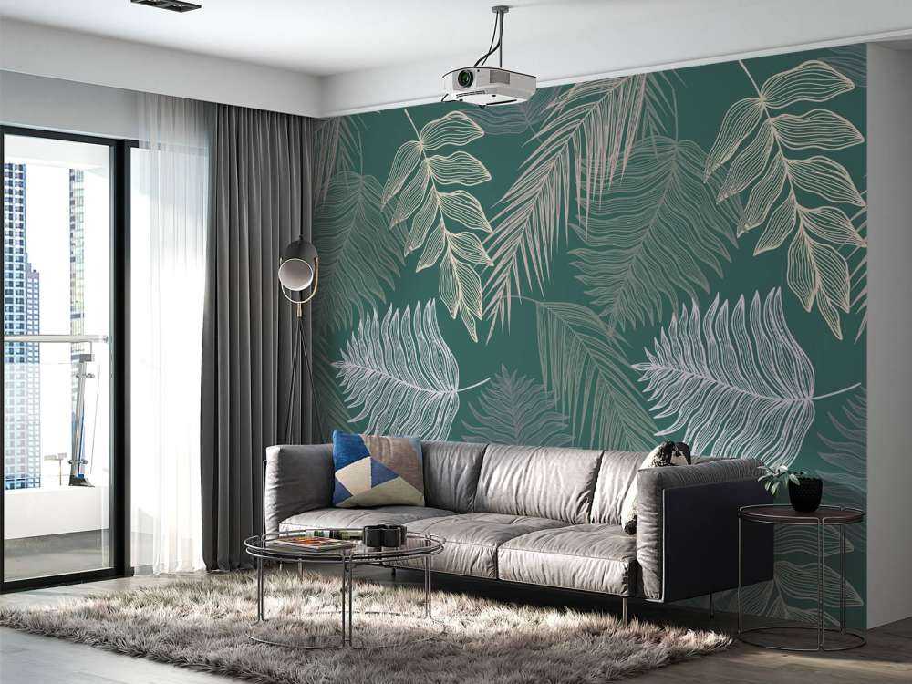 Liść palmowy na zielonym tle