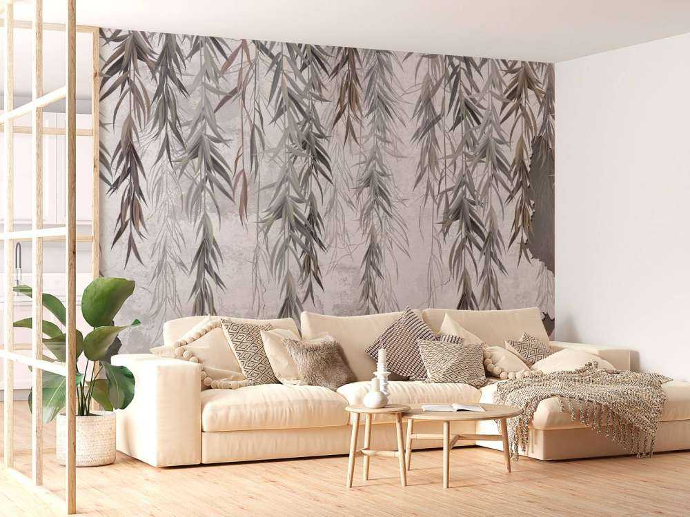 Zwisające gałęzie nad betonem