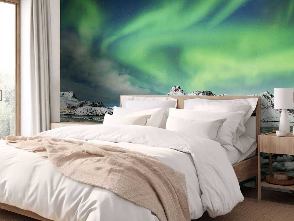 Światła północy nad zimowym krajobrazem