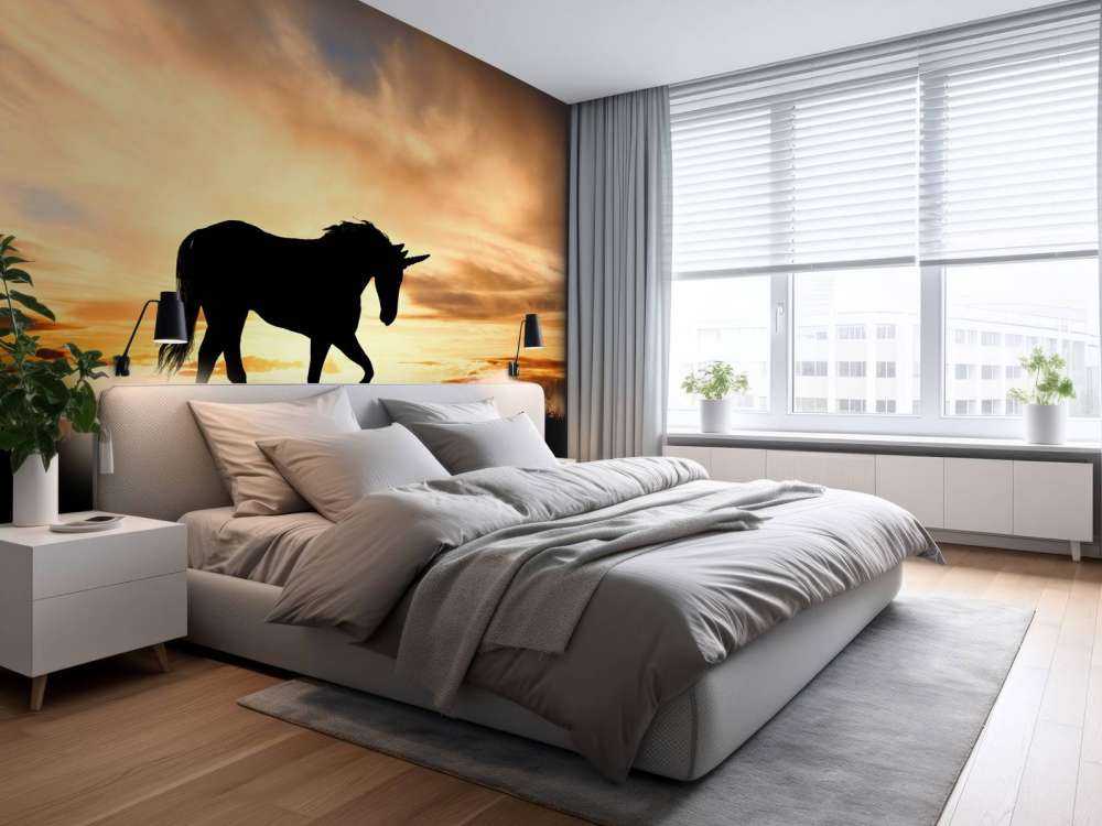 Sylwetka jednorożca przy zachodzie słońca