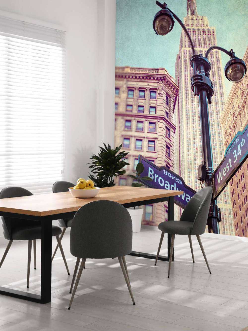 Street lamp and street signs with Empire State building in background - New York