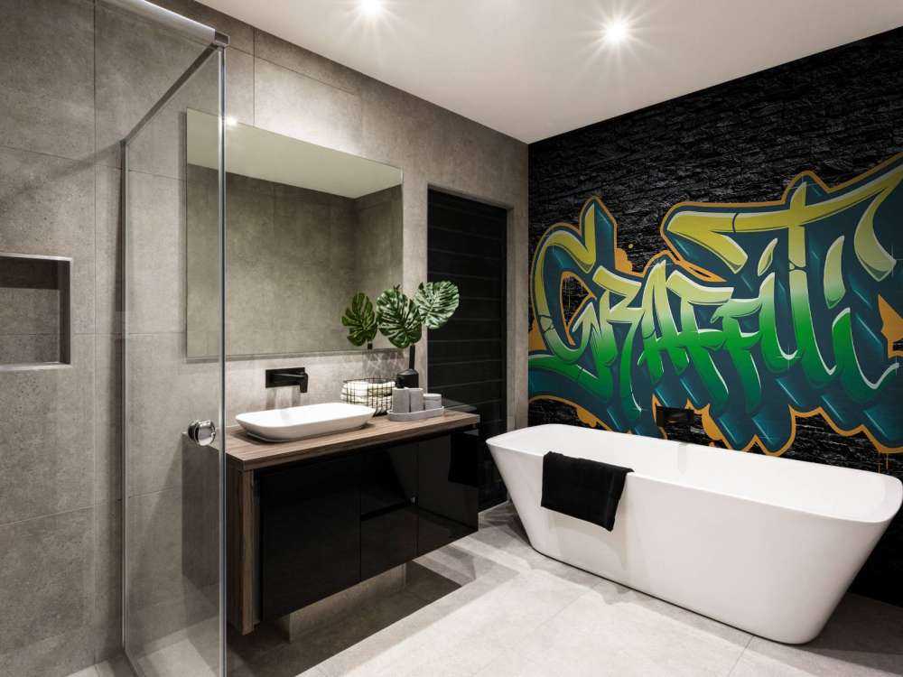 Graffiti na ścianie z czarnej cegły