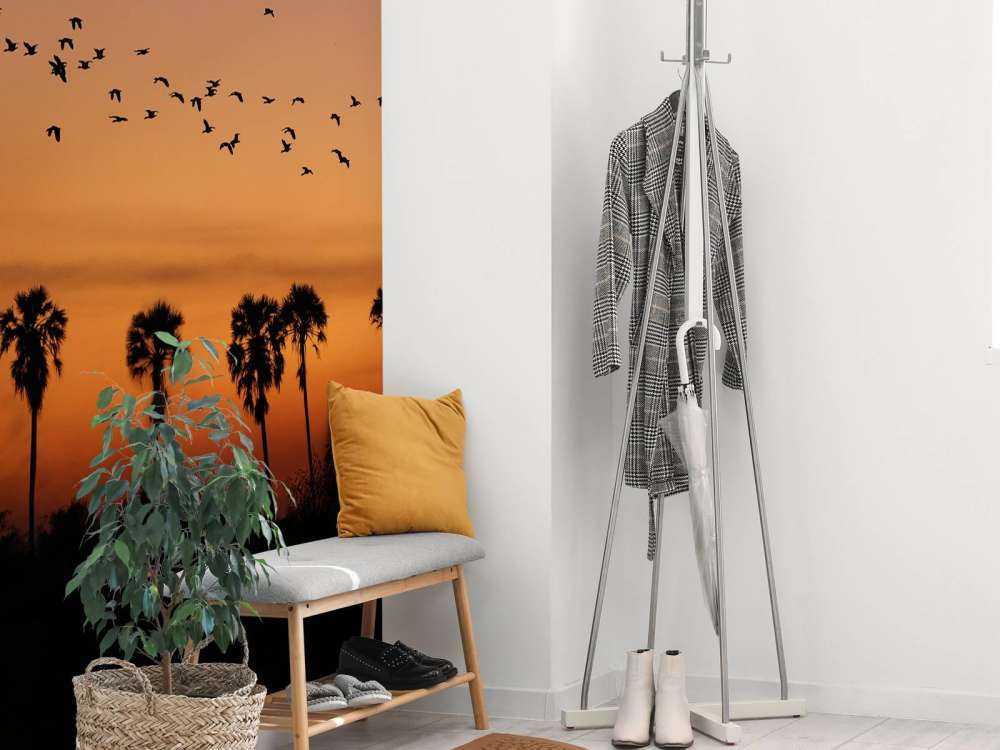 Palmy z grupą ptaków