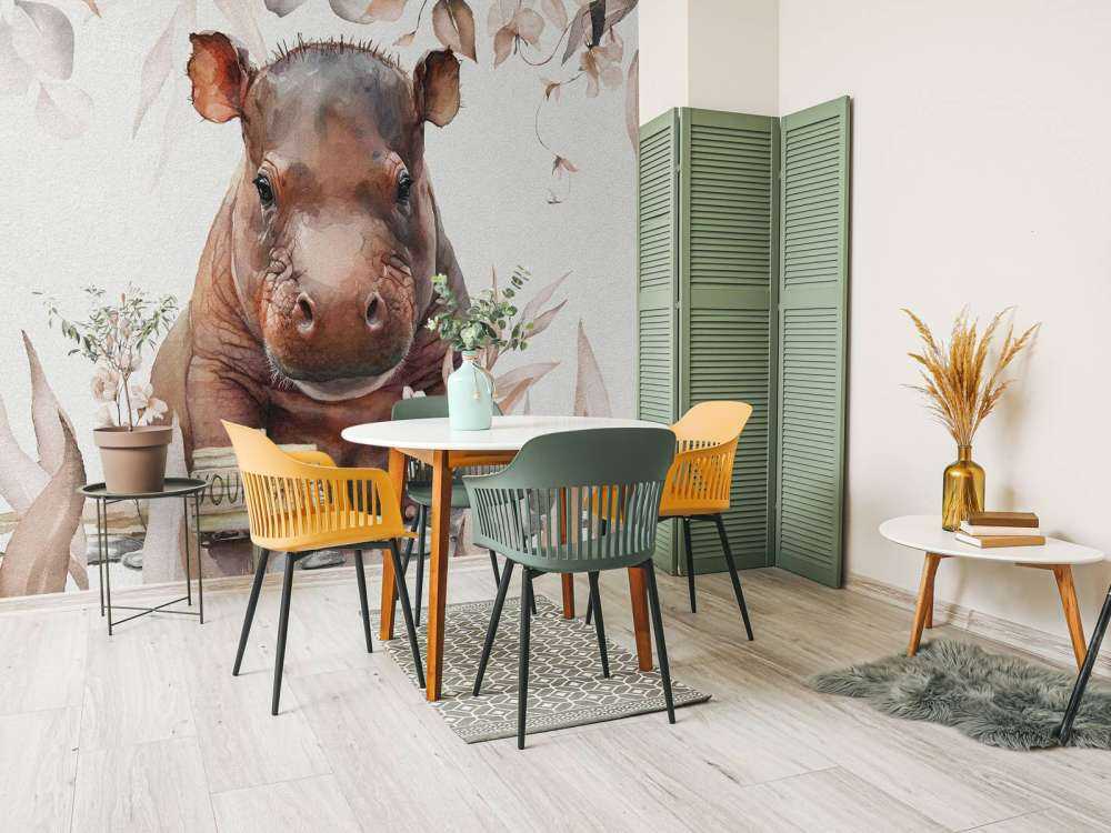 Mały hipopotam w liściach w kolorze beżowym