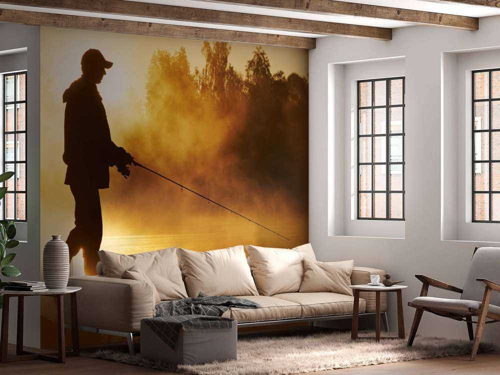 Rybak o wschodzie słońca