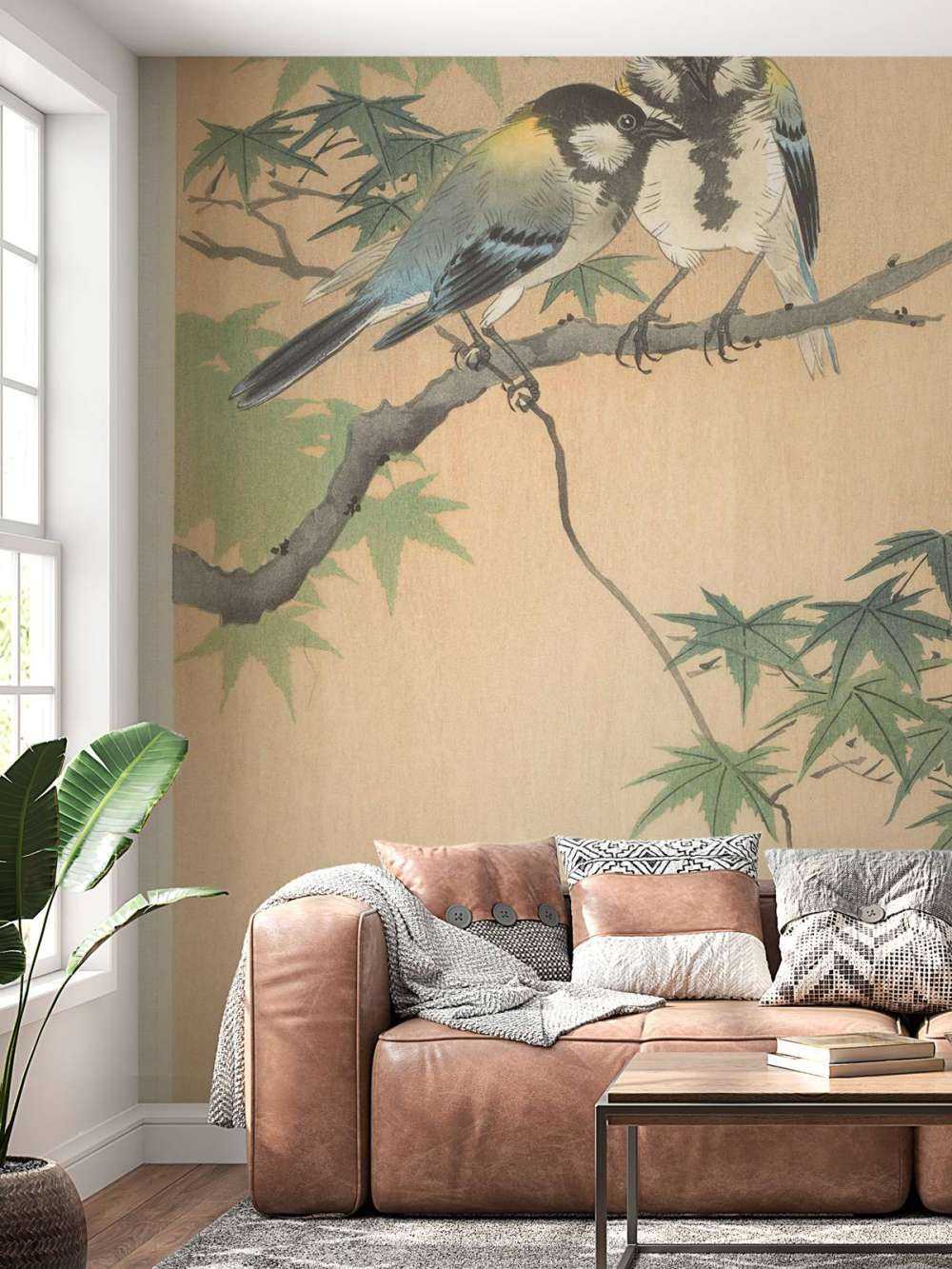 Wielkie sikorki na gałęzi klonowej