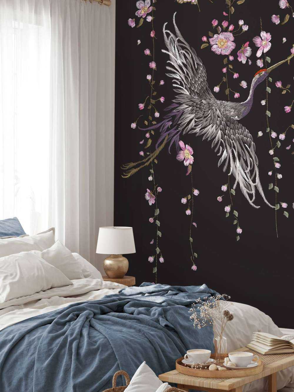 Żurawie z różowymi kwiatami