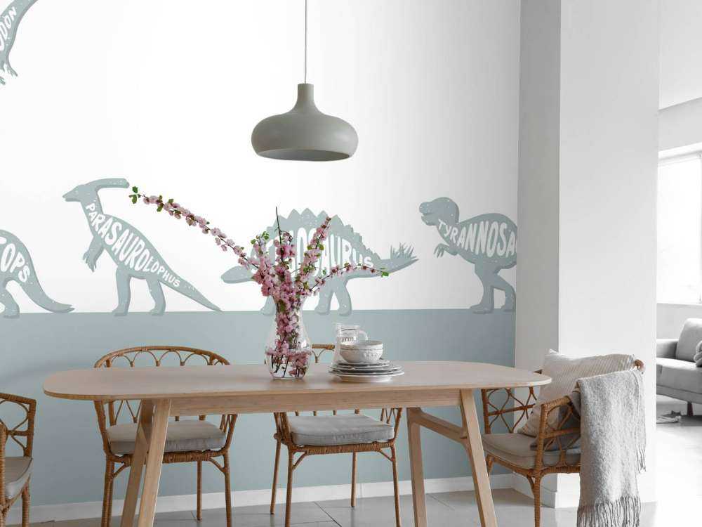 Dinozaury z tekstem w kolorze niebieskim