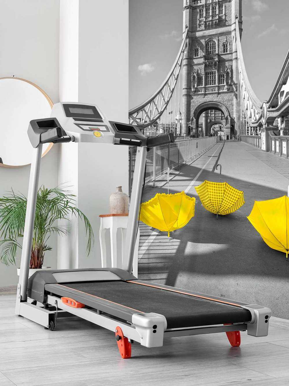 Żółte parasolki na moście wieżowym