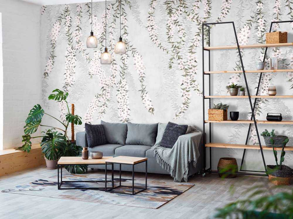 Gałęzie kwiatów na jasnoniebieskim betonie