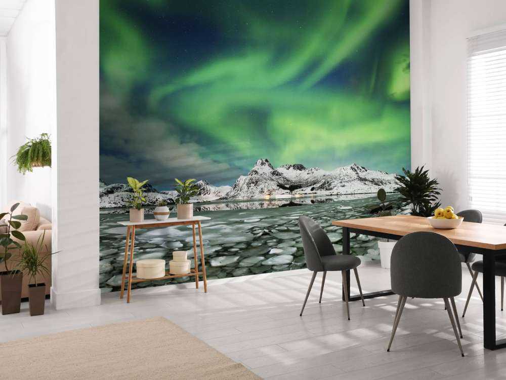 Światła północy nad zimowym krajobrazem