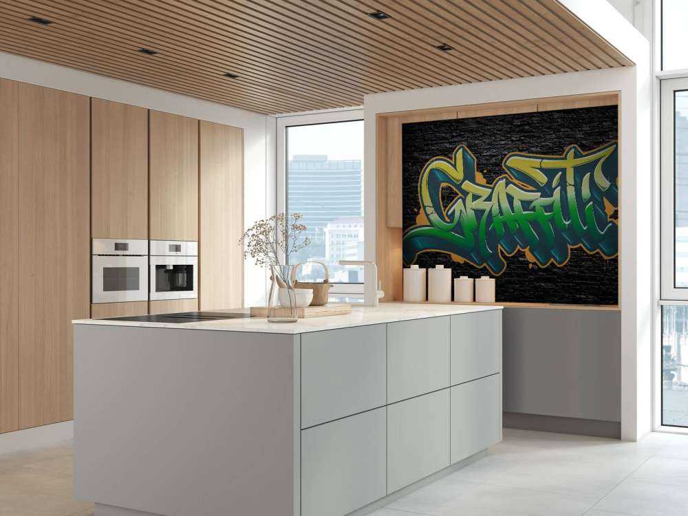 Graffiti na ścianie z czarnej cegły