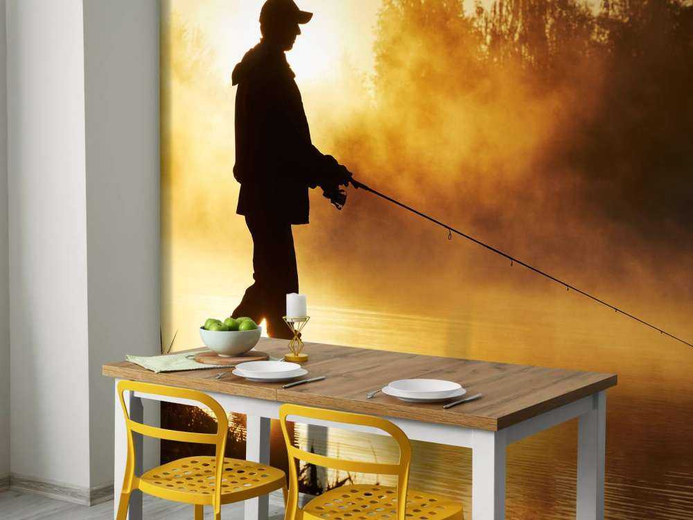 Rybak o wschodzie słońca