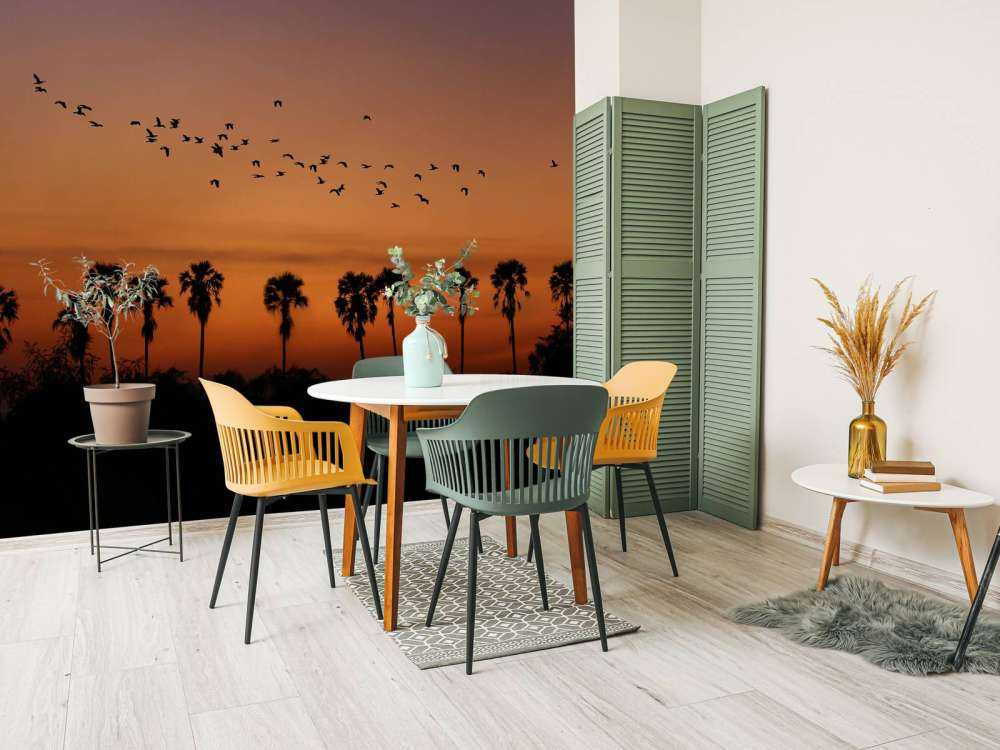 Palmy z grupą ptaków