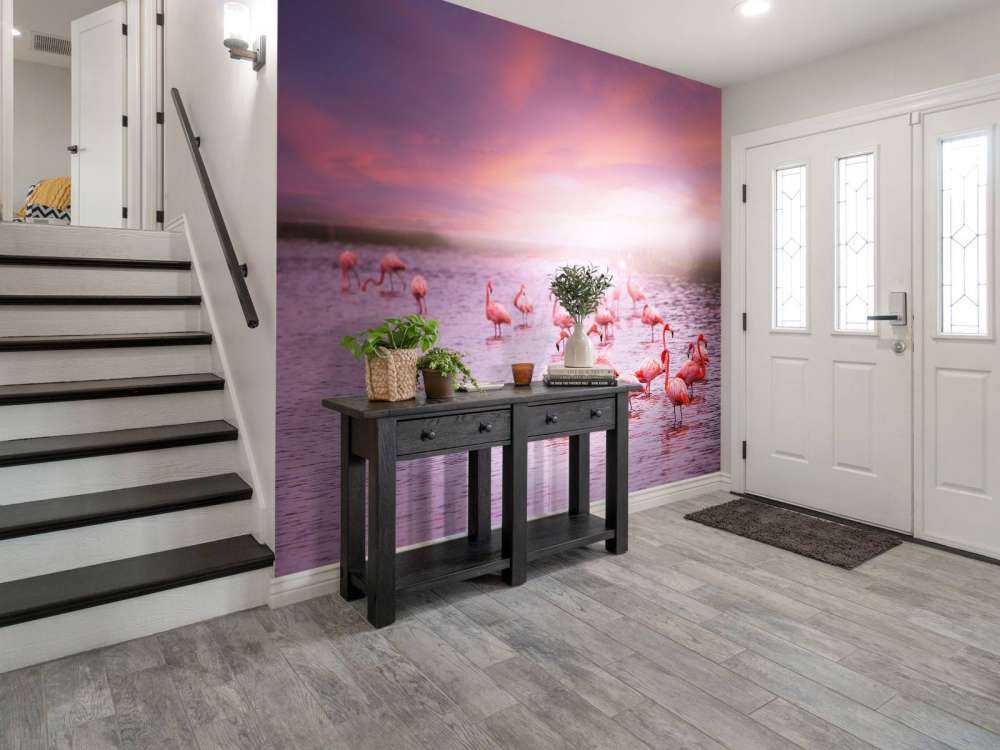 Flamingi na tle zachodzącego słońca