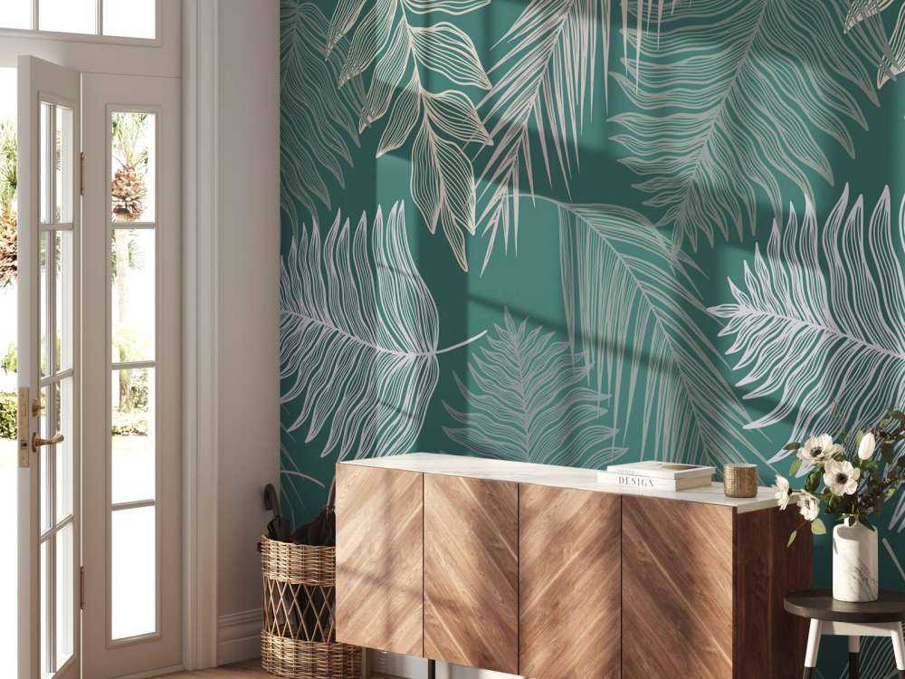 Liść palmowy na zielonym tle