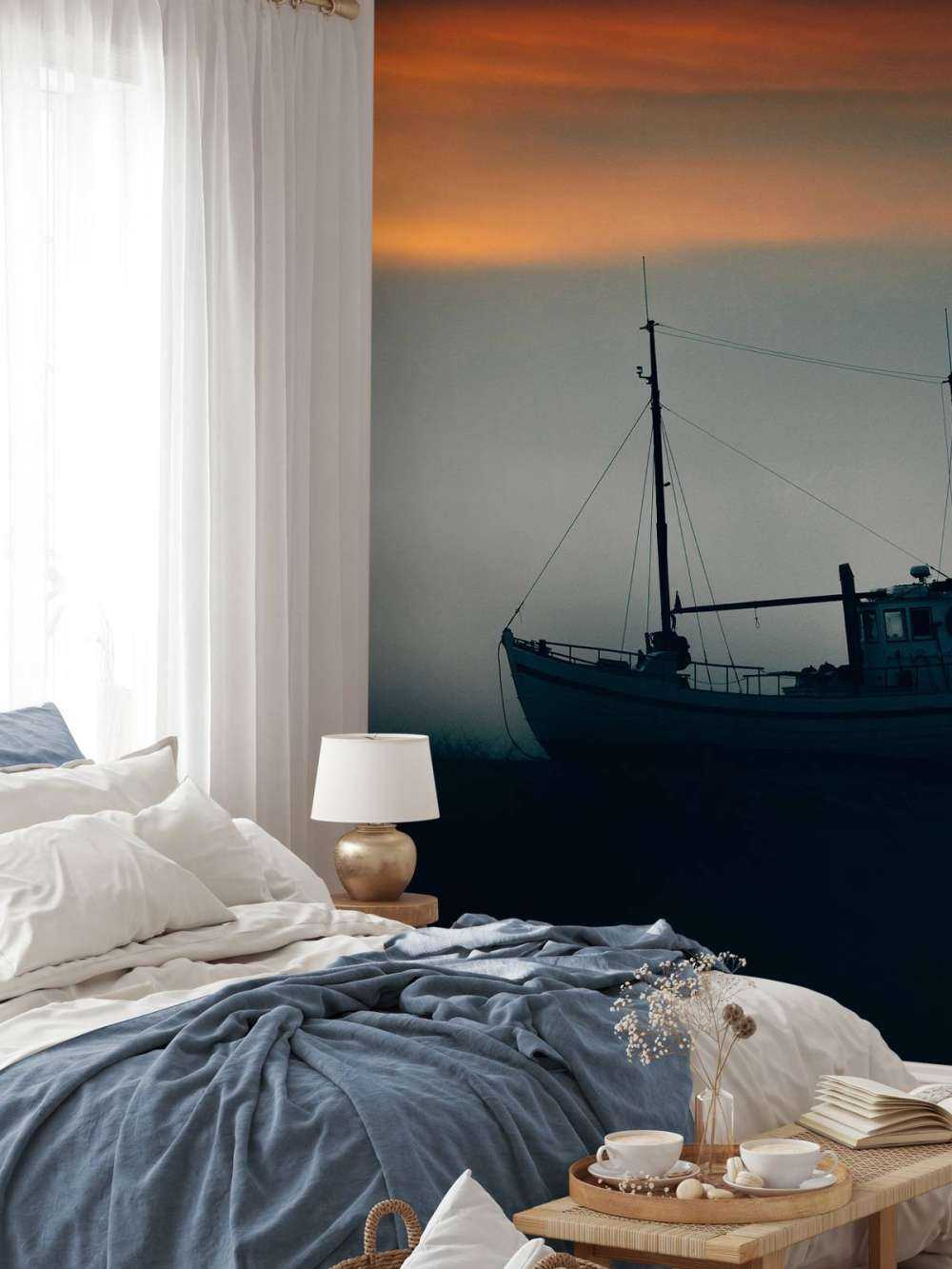 Łódź o zachodzie słońca