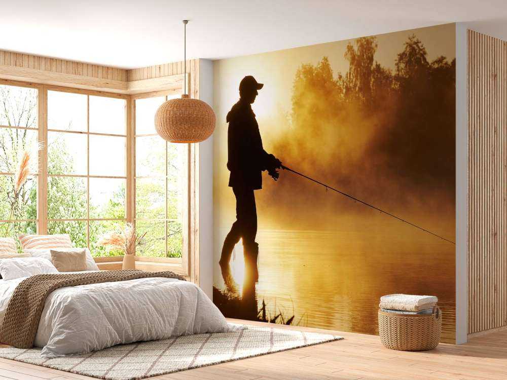 Rybak o wschodzie słońca