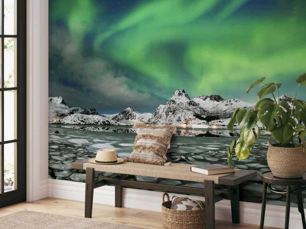 Światła północy nad zimowym krajobrazem